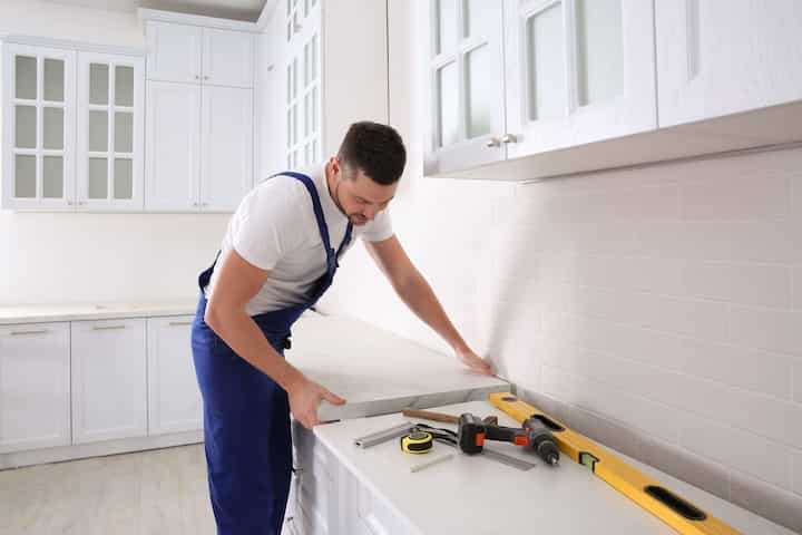 A kitchen countertop made of a durable and stain-resistant material, designed for easy maintenance in Sterling